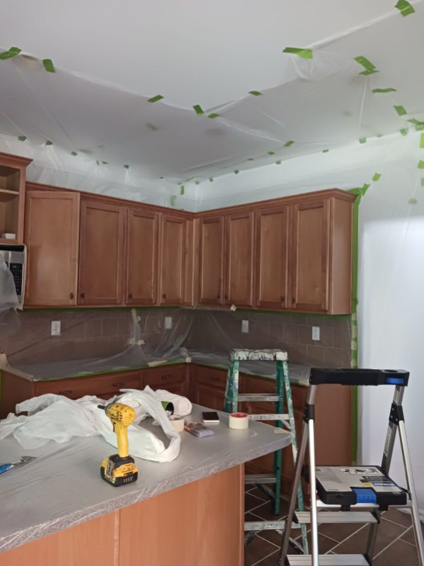 Painting a kitchen.